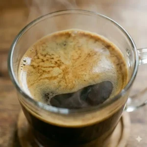 A top-down view of the beautiful golden crema on a freshly made espresso machine americano.